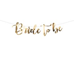 Kultainen banneri polttareihin tekstillä "Bride to be".