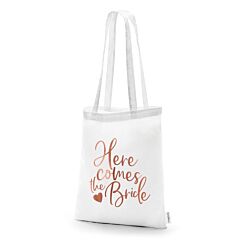 Polttareihin ihana kassi ruusukultaisella tekstillä "Here comes the Bride".