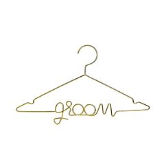 Kultainen vaateripustin "groom".