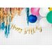 Kaunis kultainen banneri, tekstillä "Happy Birthday".